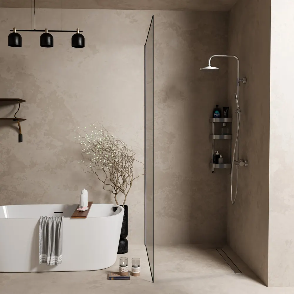 Warm-toned microcement bathroom with a walk-in shower and linear drain